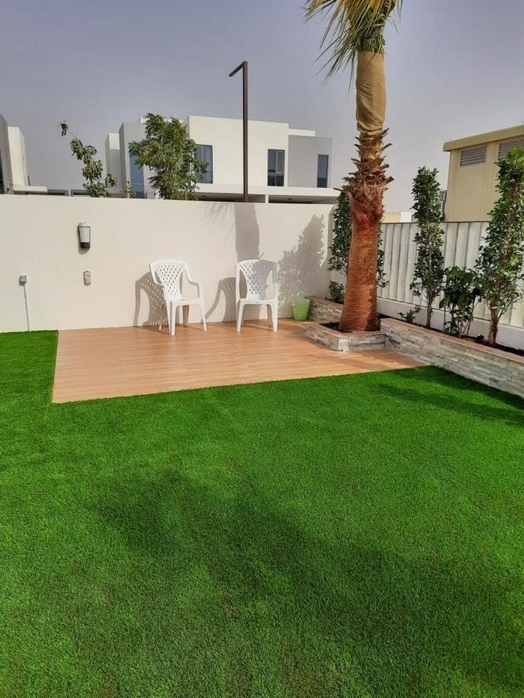 Artificial grass and modern garden pathway in Qurum Muscat