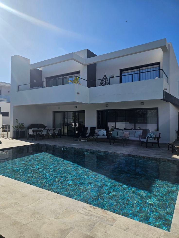 Exterior villa painting and weather resistant coating in Muscat Oman